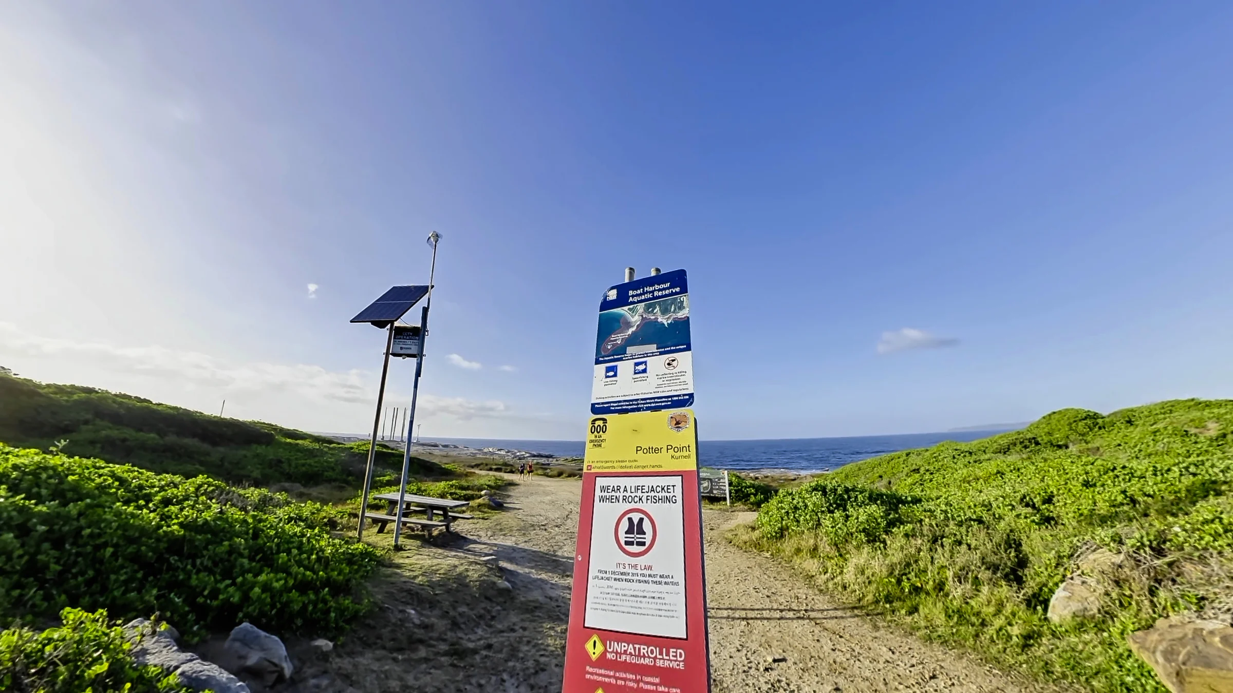 Boat Harbour Aquatic Reserve and Potter Point signs beside the coastal access path