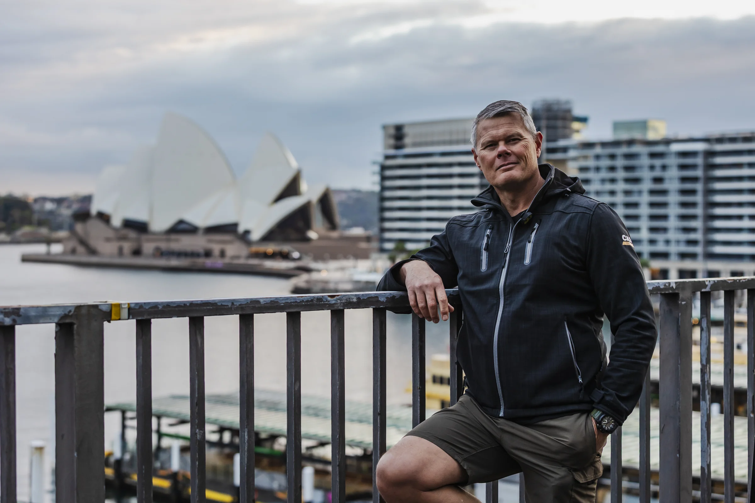 Rob at the Cahill Walk with the Opera House across the water