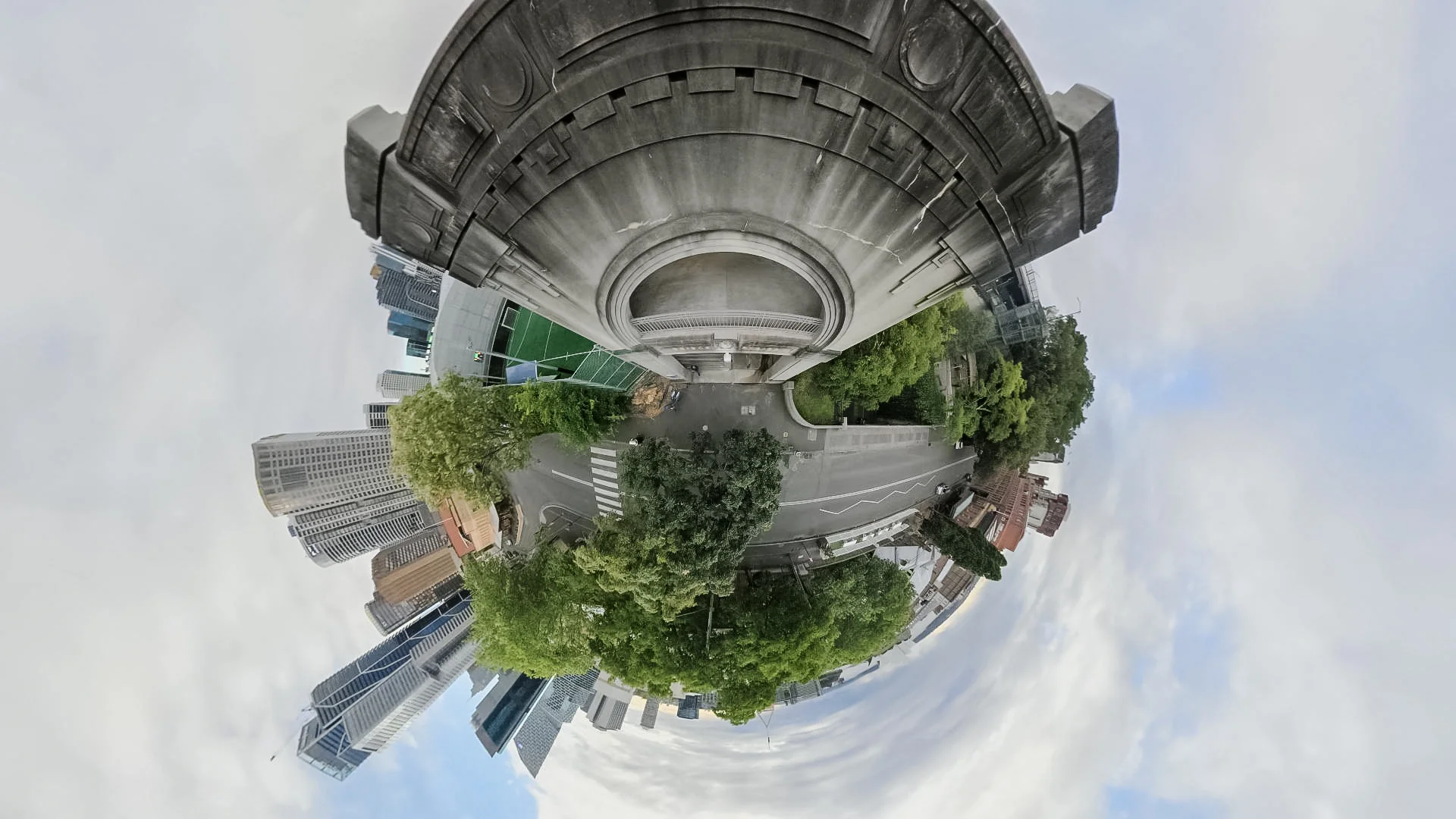 Circular 360-camera perspective of the surrounding buildings and park