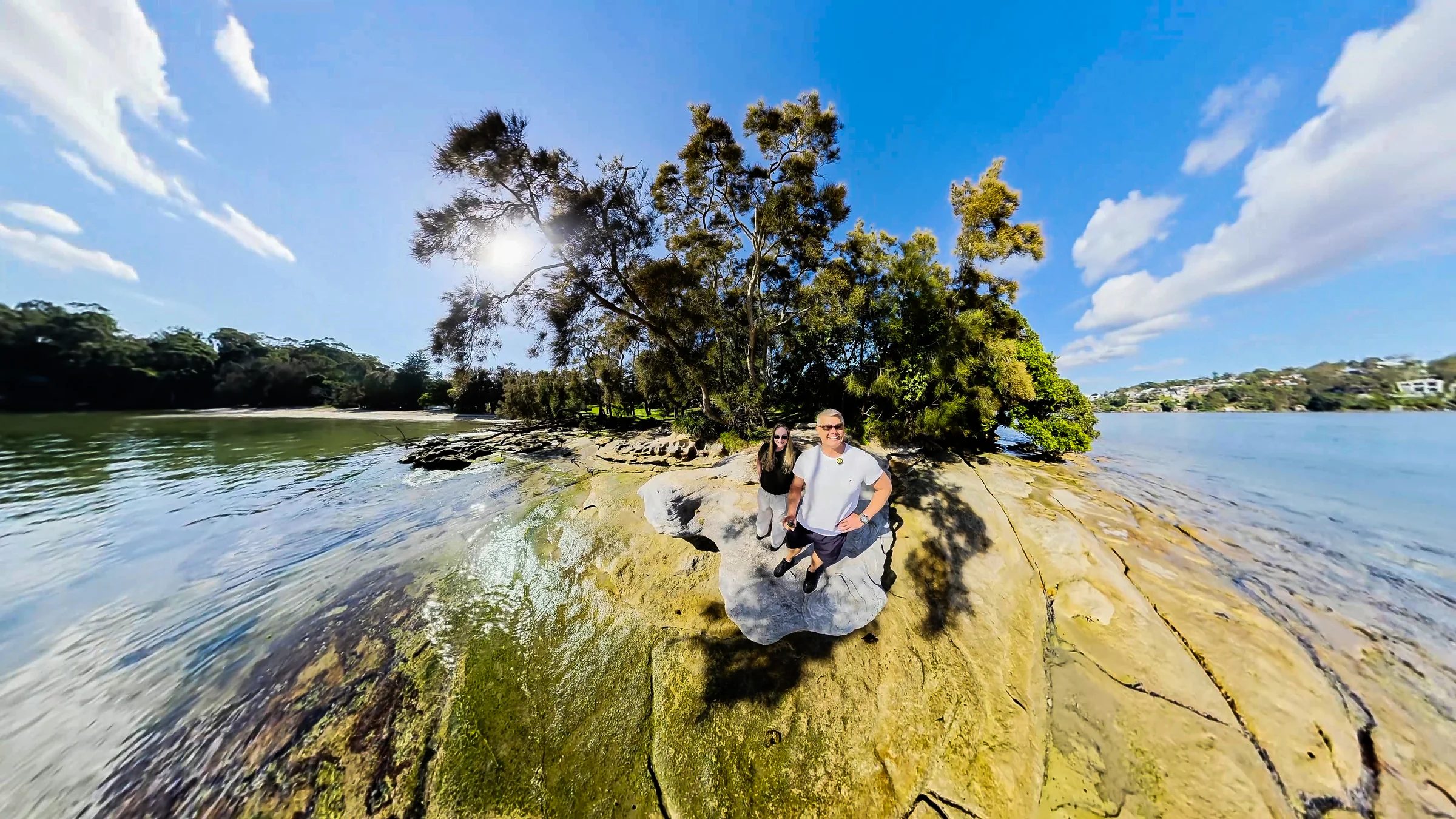 Rob and Sue on a rock beside the water at Darook Park