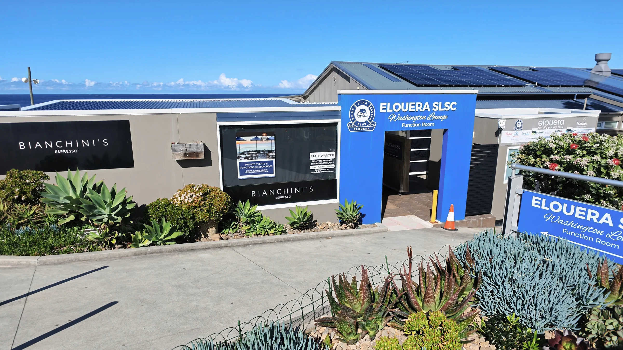 Entrance to Elouera Surf Life Saving Club with Bianchini’s café beside it