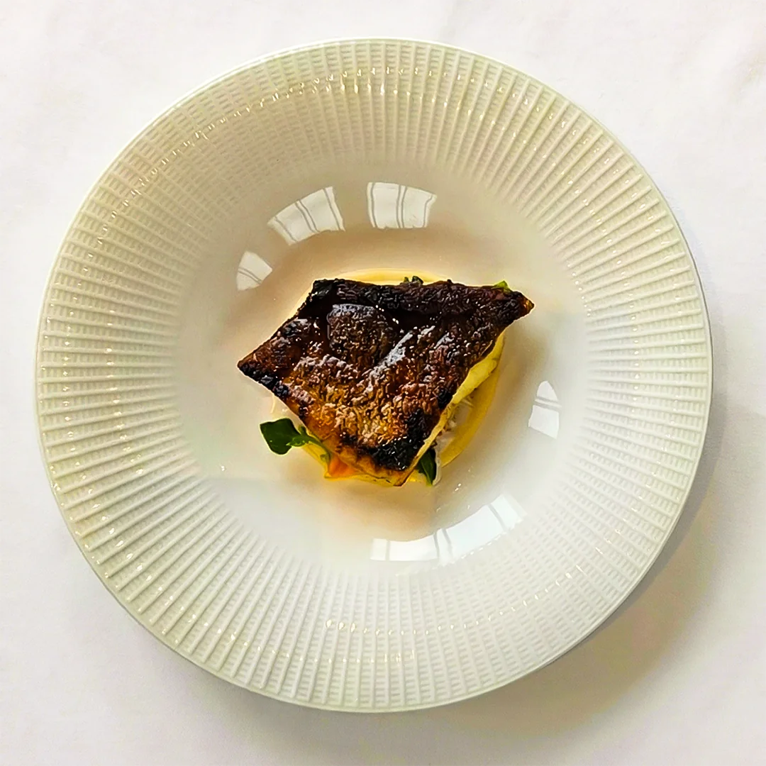 Plated main course in a white bowl