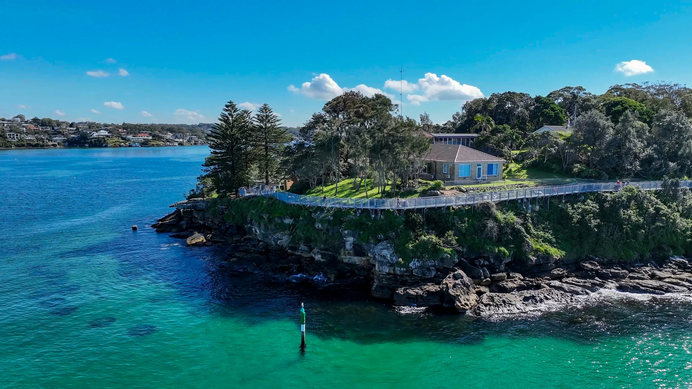Aerial view of the headland and walkway above Port Hacking