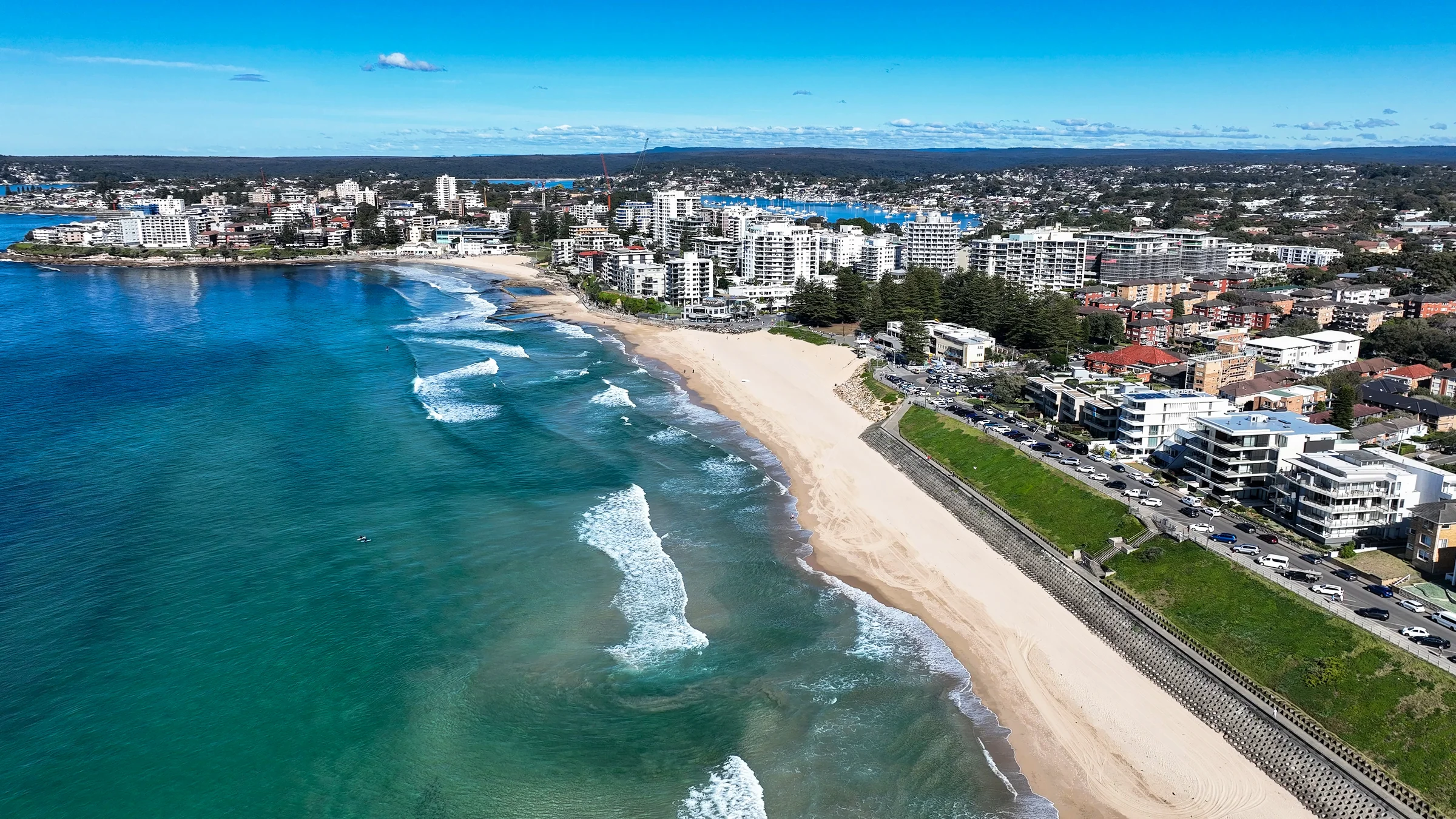 Aerial view south along North Cronulla Beach towards the ocean pools and South Cronulla