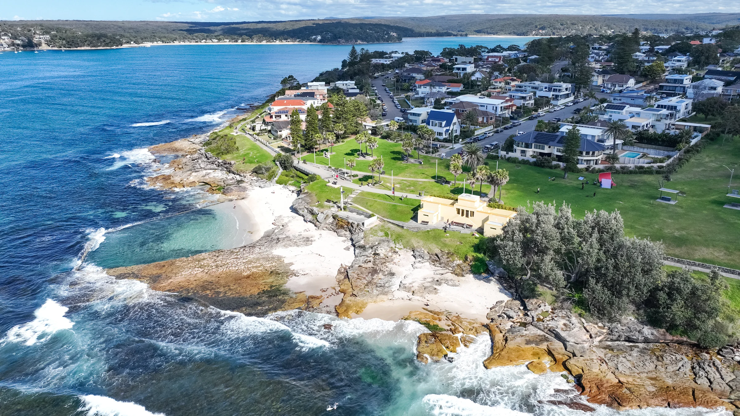 Aerial view of Oak Park beach, park and surrounding Cronulla coastline