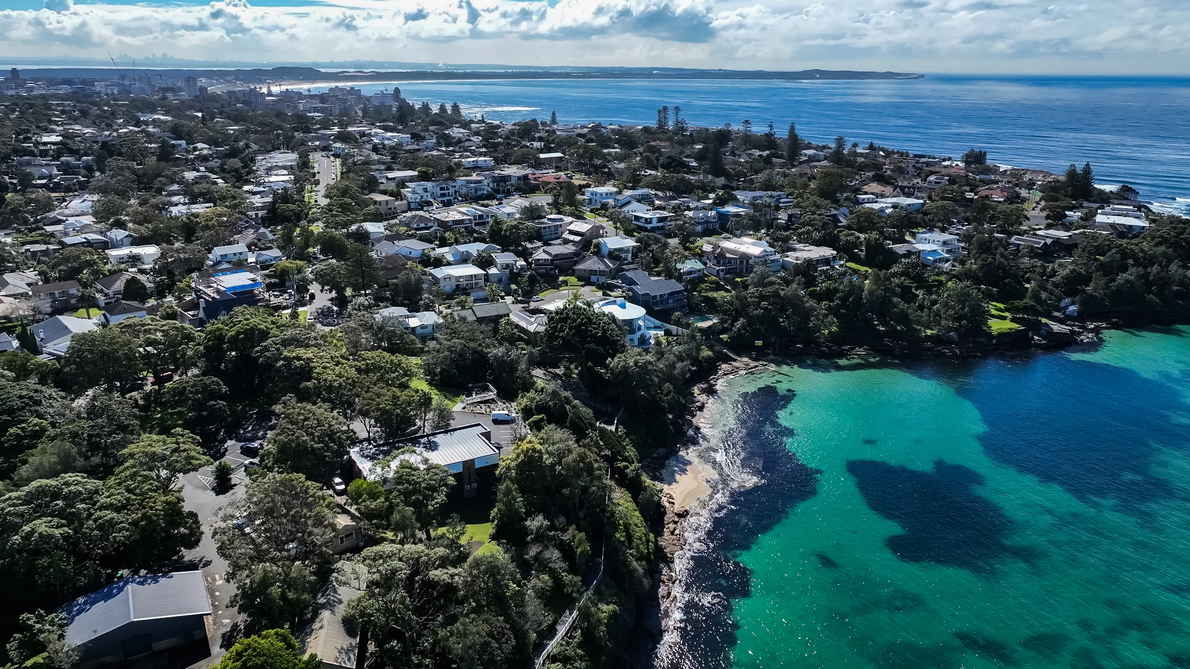 Wide aerial view of Salmon Haul Bay and the southern Cronulla peninsula