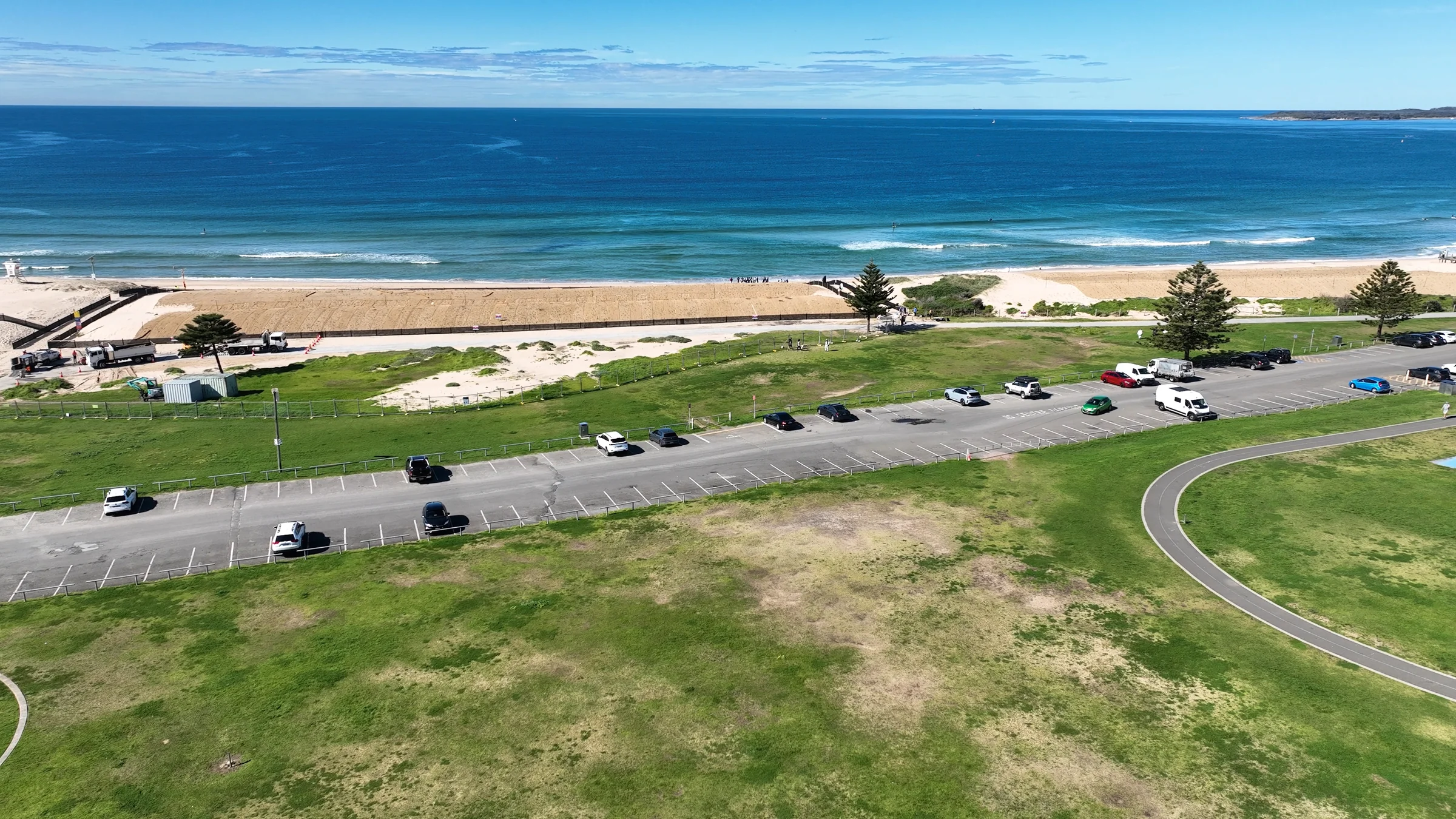 Aerial view of the reserve, beachside car park and ocean at Wanda