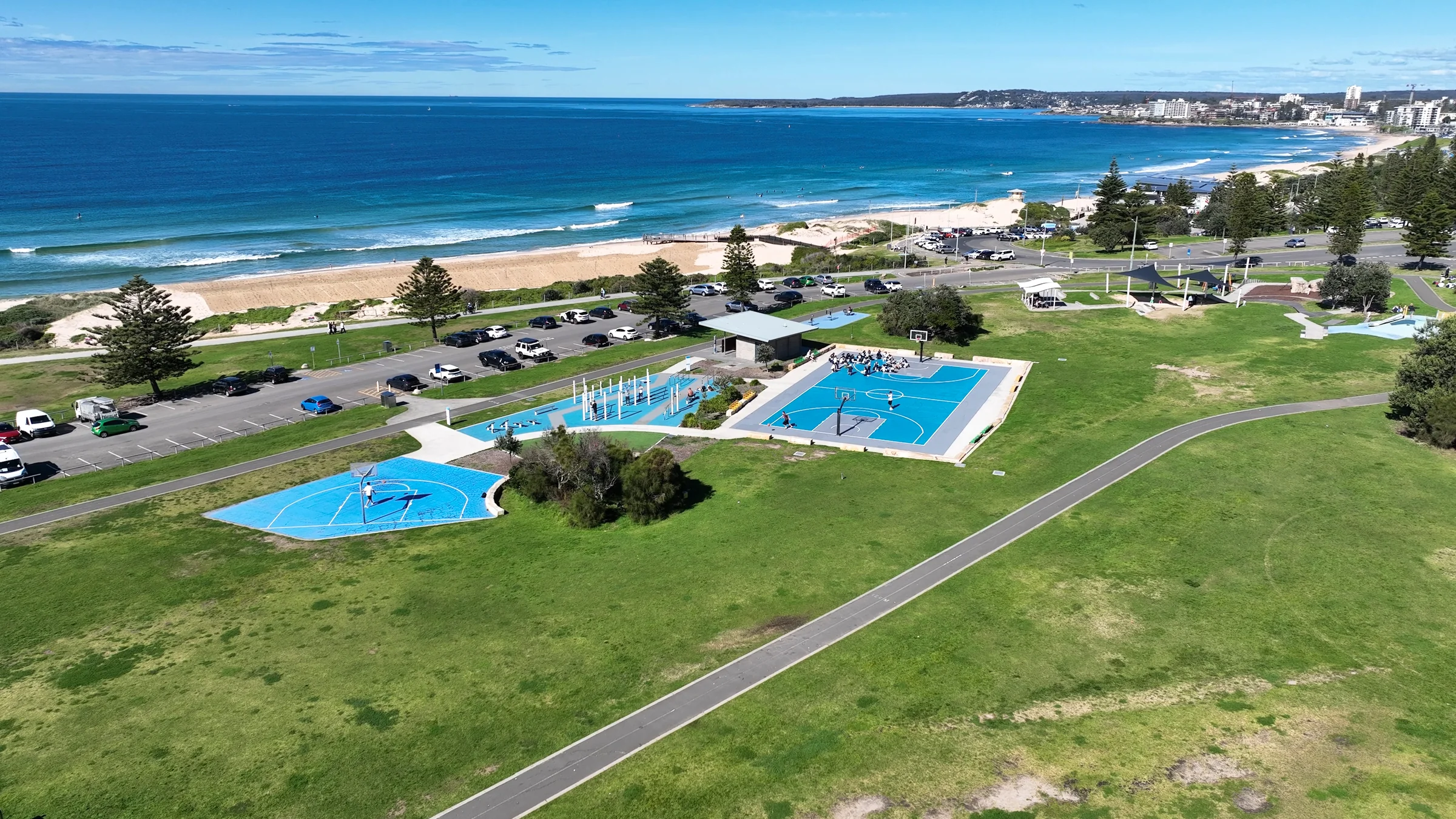 Aerial view of outdoor exercise equipment, a basketball court and separate shooting key at Don Lucas Reserve
